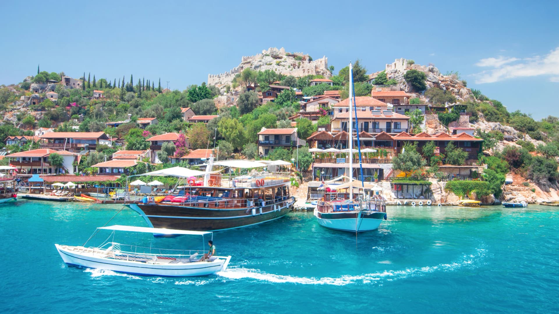 Many boats at sea  blue water 