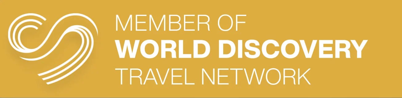 Logo and text: Member of World Discovery Travel Network on gold background