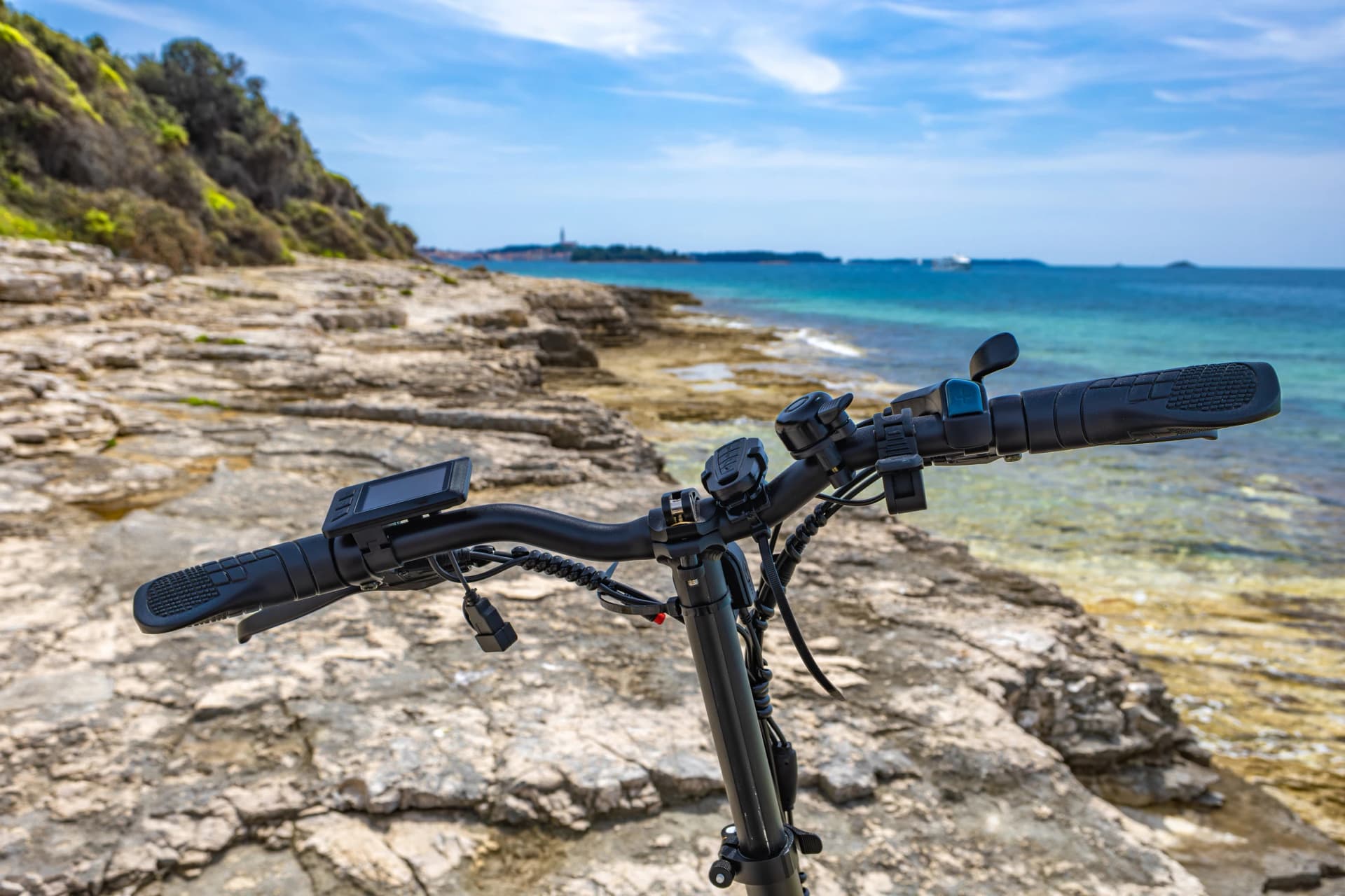 A small foldable electric tourist bike, exploring the coast by bike, bicycle tourism in Croatia